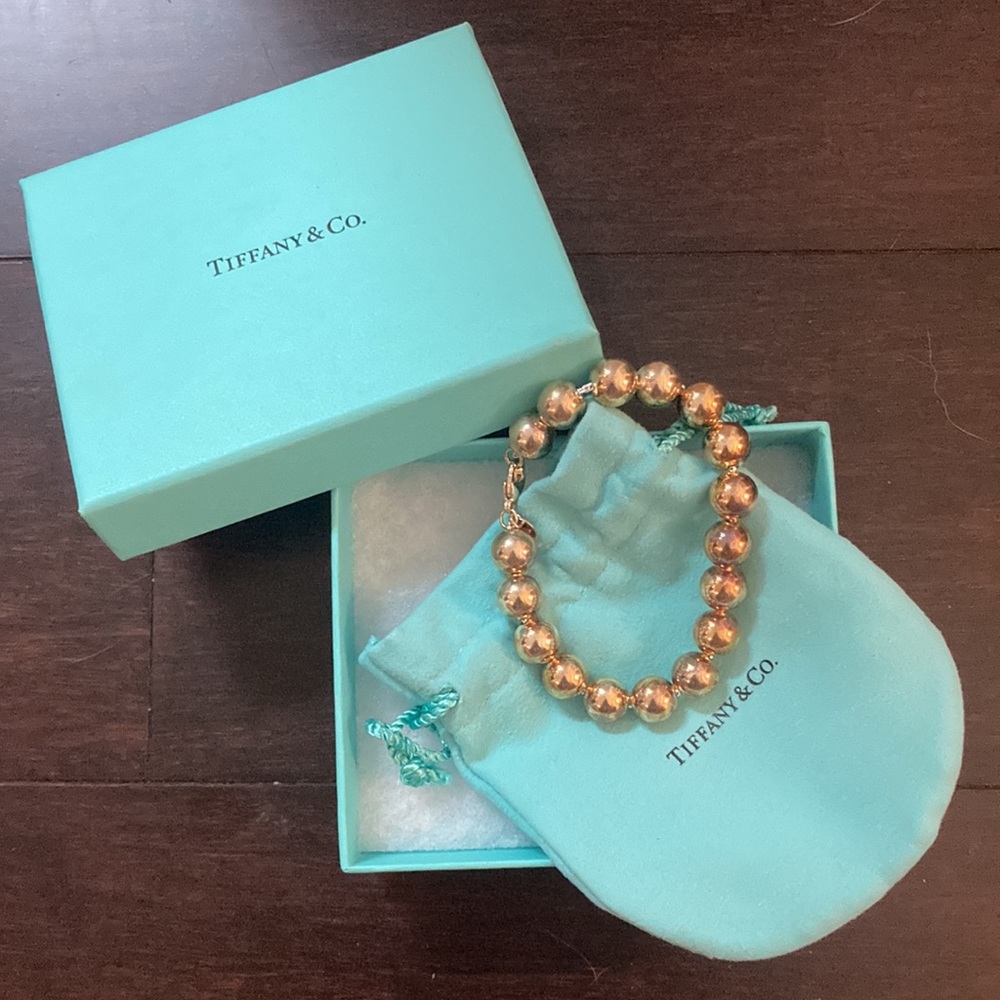 A gold Tiffany & Company bracelet. Never worn. Retail price: $500.